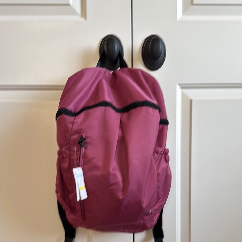Zella NEW Pink Backpack with Black Accents and Durable Design